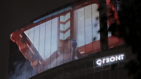 Advertisement-Billboards-on-Shibuya-Crossing-at-Night,-Tokyo,-Japan