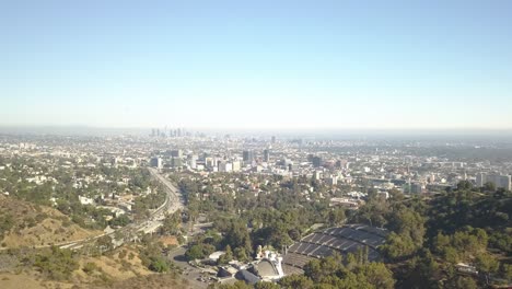 Slow-push-in-aerial-shot-of-city-of-los-angeles-from-a-hill-high-up-location