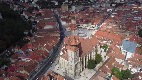 Sky-high-aerial-shot-over-old-town-centre-of-Brasov,-Romania