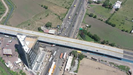 RAJKOT-CITY-AERIAL-VIEW-Drone-camera-moving-forward-where-there-is-a-traffic-jam-with-lots-of-vehicles-below