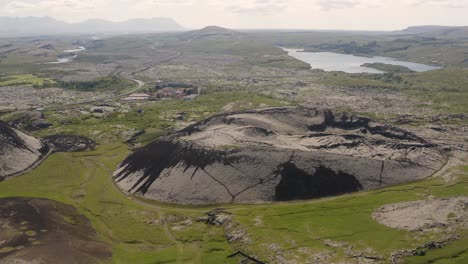 Aerial-video-circling-Raudbrok-crater-near-Lake-Hreðavatn-in-western-Iceland