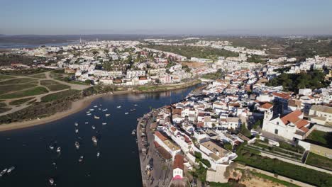 Aerial-View-Of-Ferragudo,-A-Portuguese-Civil-Parish-Beside-Arade-River
