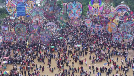 Flying-over-Sumpango-Kite-Festival-During-All-Saint's-Day-In-Sumpango,-aerial