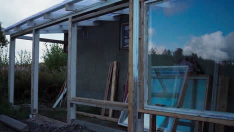 A-Man-is-Constructing-a-Greenhouse-in-Indre-Fosen,-Norway---Timelapse