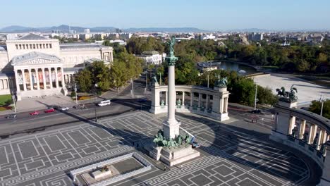 Arcing-aerial-reveals-Heroes'-Square-with-Millennium-Monument,-Budapest,-Hungary
