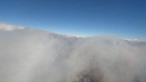 4K-Plane-View-of-Clouds-Revealing-Appalachian-Mountains,-VA