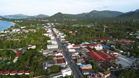 Drone-fly-above-koh-samui-Thailand-travel-destination-for-holiday-makers-aerial-sunset-view-of-mae-nam-area