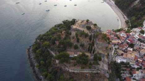 Parga-Greek-town-coastline-at-the-Ionian-coast-with-Chapel-of-the-Assumption-of-the-Virgin,-Aerial-view