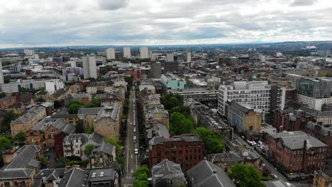 Panoramic-aerial-4k-view-of-Glasgow,-Scotland,-UK-cityscape-living-neighbourhood-in-west-end