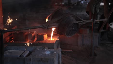 POV-SHOT-Molten-iron-from-the-furnace-is-poured-into-the-mold