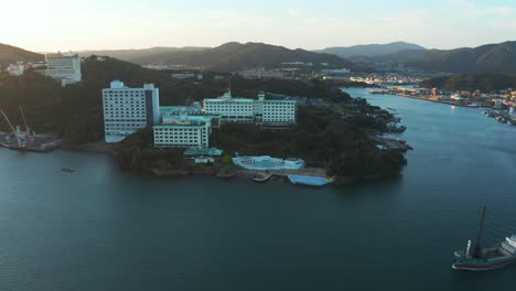 Sun-Rising-over-Toba-City-and-Islands-of-Japan-in-Mie-Prefecture,-Aerial-Pan