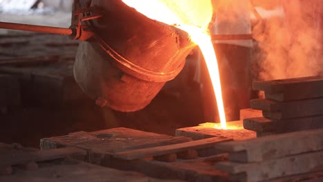 POV-SHOT-pouring-high-degree-Celsius-iron-from-furnace