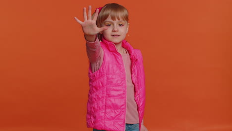 Girl-kid-say-no-hold-palm-folded-crossed-hands-in-stop-gesture,-warning-of-finish,-prohibited-access