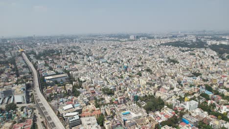 Aerial-video-showing-heavy-traffic-at-Bangalore,-India's-Central-Silk-Board-intersection