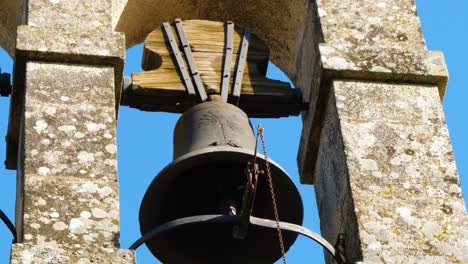 Antique-Bell-of-Santa-María-de-Feá-church,-Toén,-Spain