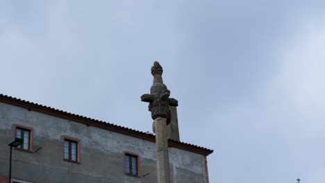 Stone-Statue-Overlooking-Vinhais,-Bragança,-Portugal