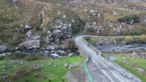 Drone-shot-of-Gap-of-Dunloe,-Bearna-or-Choimín,-mountain-pass-in-County-Kerry,-Ireland
