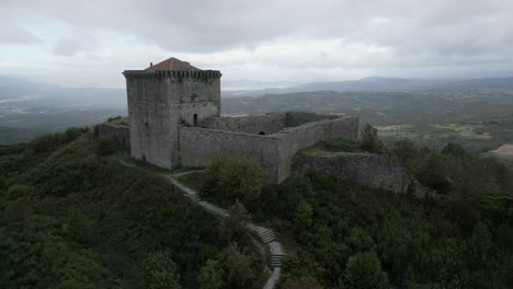 Aerial-orbit-around-castle-of-Monforte-de-Rio-Livre-in-Chaves,-Vila-Real,-portugal