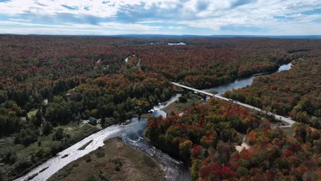 Aerial-View-Over-Autumn-Forest-And-River-In-The-USA---Drone-Shot
