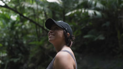 Slow-motion-shot-of-a-woman-smiling-in-a-Puerto-Rican-Jungle