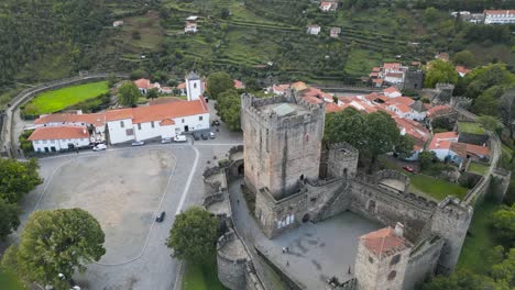 Drone-push-in-to-tower-of-medieval-castle-in-historic-center-of-Braganza-Portugal