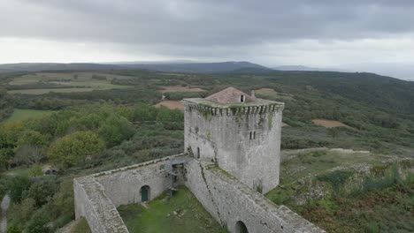 Old-historic-castle-of-Monforte-de-Rio-Livre-in-Chaves,-Vila-Real-Portugal-on-ridgeline