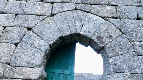 Teal-Doorway-of-Monforte-Castle,-Chaves,-Portugal