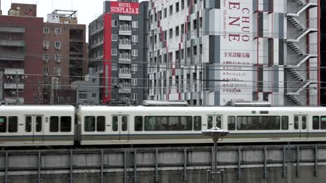 The-Yamatoji-Rapid-Service-Going-Past-Shinsekai-Neighbourhood-In-Osaka