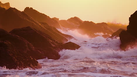 Rough-Waves-Blowing-On-A-Rock-Background