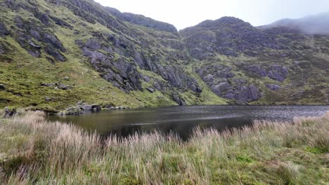 Mountainside-lakeside-at-Coumdala-in-The-Comeragh-Mountains-Waterford-Ireland-on-a-crisp-winter-day