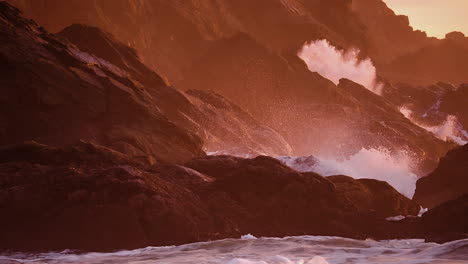 Ocean-Waves-Crashing-On-The-Rocky-Coastline-And-Cliffs-During-Golden-Hour