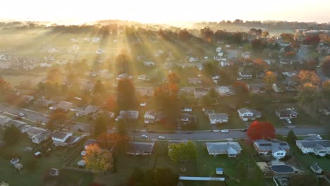 American-neighborhood-under-fog-illuminated-by-golden-sunlight-rays