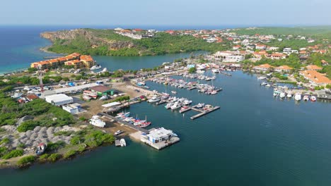 Panoramic-aerial-establishing-view-of-Spanish-Waters-fishing-port-harbor-at-Curacao
