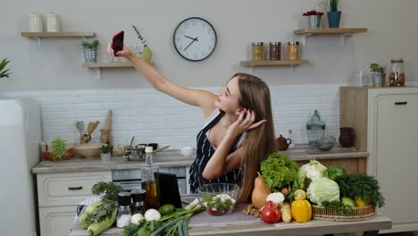 Blogger-girl-preparing-food,-taking-photos-on-phone,-making-selfie-to-social-media-or-video-stories