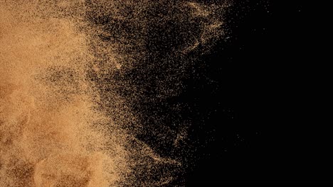 Bronze-Particles-Fly-on-a-Black-Background-The-Wind-Blows-Away-Colored-Sand-Powder-Spray-Texture-3d