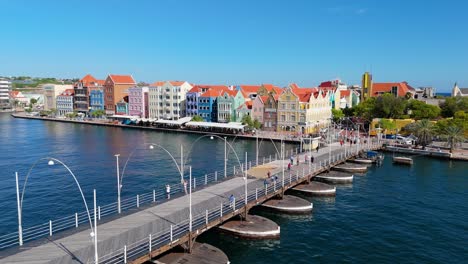 Drone-rises-above-Queen-Emma-pontoon-bridge-for-pedestrians-to-Handelskade-Punda-District-Willemstad-Curacao