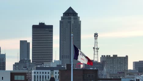 Iowa-flag-waving-in-front-of-Des-Moines-skyline