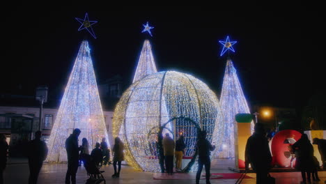 beautiful-giant-christmas-trees-of-light-in-leiria-portugal-wide-gimbal-shot-slow-motion