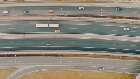 Aerial-view-of-Cars-driving-on-multiple-highways