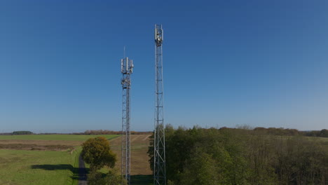 5G-cellular-infrastructure-in-France,-aerial-fast-circular-movement