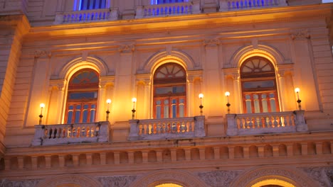 Details-of-the-facade-of-Banca-Popolare-di-Bari,-Bank-in-Naples-at-dusk,-Italy