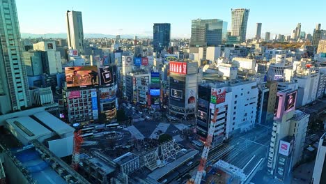 Aerial-View-of-Shibuya-Crossing,-one-of-the-busiest-crosswalks-in-the-world