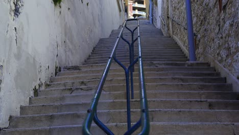 Ascend-the-endless-stairs-in-the-city-of-Monaco,-leading-to-the-pinnacle-of-urban-charm-and-scenic-views