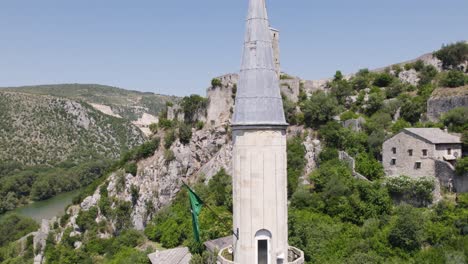 Počitelj's-Cliffside-Mosque-detail-and-Fort,-Bosnia-Herzegovina-Aerial