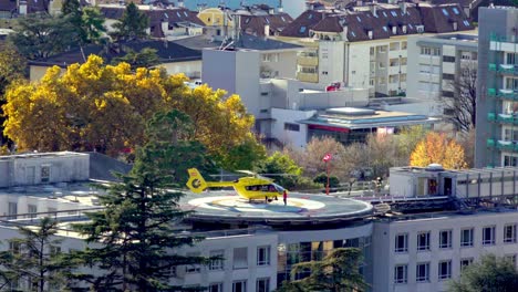A-helicopter-preparing-for-takeoff-from-the-heliport-of-the-hospital-in-Merano-on-a-sunny-but-windy-autumn-day