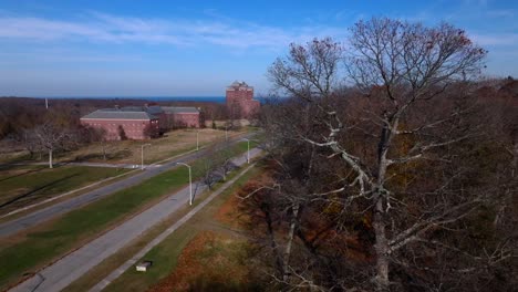An-aerial-view-of-the-abandoned-Kings-Park-Psychiatric-Center-on-a-sunny-day-on-Long-Island,-NY