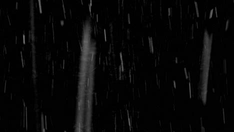 Snowfall-against-black-background,-snow-strom,-blizzard---not-generated,-real-footage