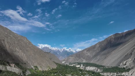 Time-lapse-open-valley-of-Hunza-peak-with-snow-and-clouds-transition,-Pakistan-trek