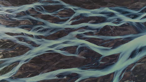 Braided-Streams-Of-Glacial-River-In-Kálfafell,-Iceland---Aerial-Drone-Shot