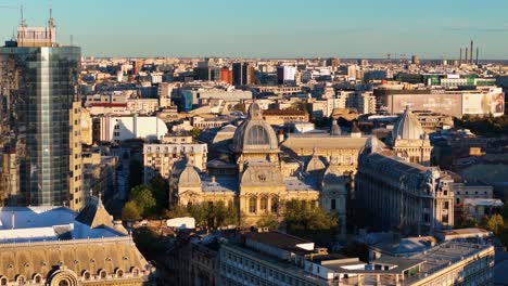 Aerial-View-Of-The-CEC-Palace-With-The-Bucharest-City-Skyline-In-The-Background,-Romania